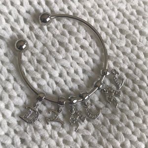 - Beautiful dangling initial charms